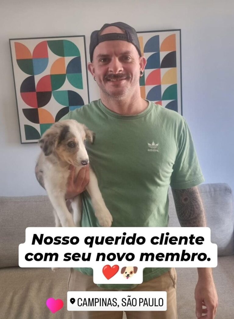 Cliente do canil Jackmel com seu filhote